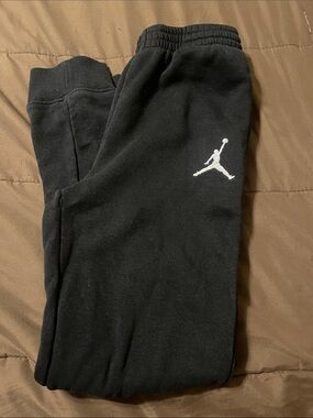 Jordan Kids Black Joggers with White Jumpman, size 12-13 yrs old
